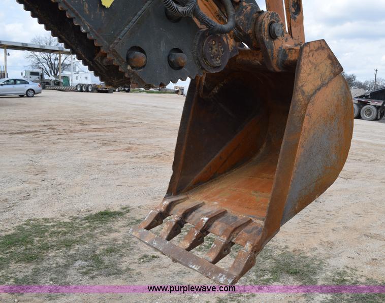image for item E6286 2011 Case 580N backhoe with Bayonet Breaker