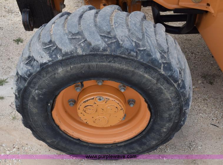 image for item E6286 2011 Case 580N backhoe with Bayonet Breaker