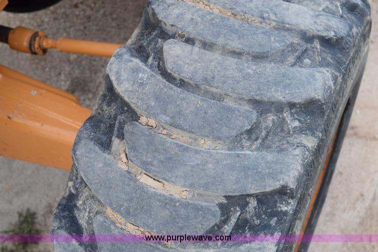 image for item E6286 2011 Case 580N backhoe with Bayonet Breaker