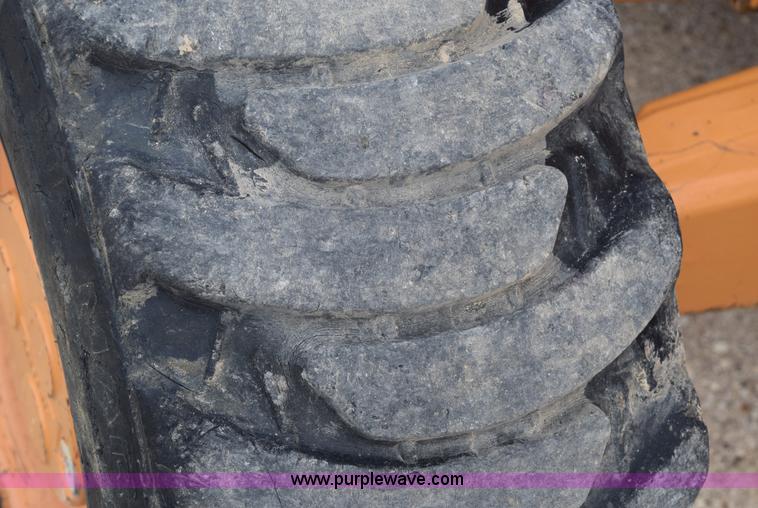 image for item E6286 2011 Case 580N backhoe with Bayonet Breaker