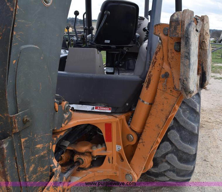 image for item E6286 2011 Case 580N backhoe with Bayonet Breaker