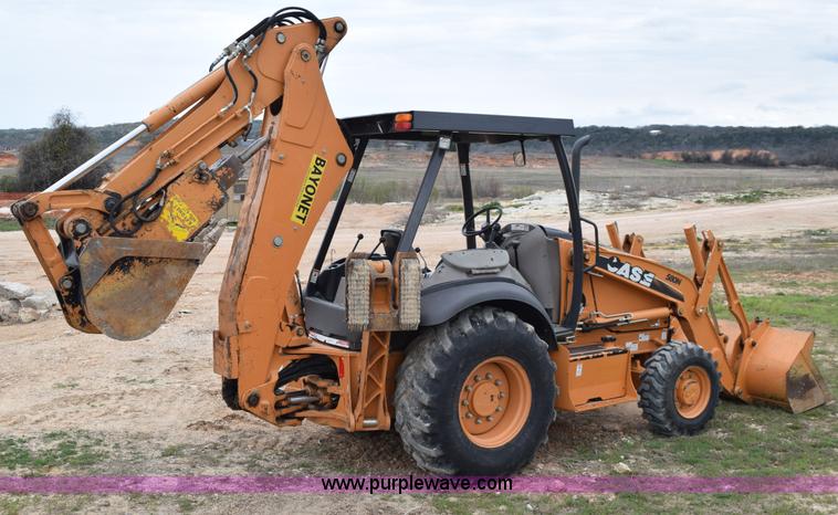image for item E6289 2011 Case 580N backhoe with Bayonet Breaker