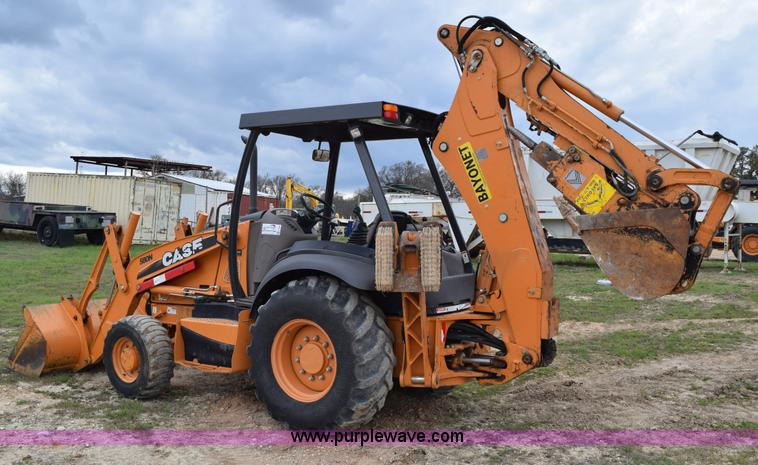 image for item E6289 2011 Case 580N backhoe with Bayonet Breaker