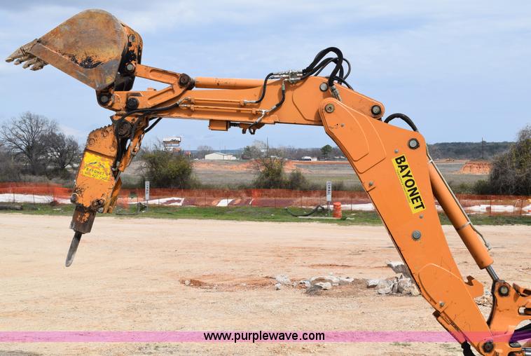 image for item E6289 2011 Case 580N backhoe with Bayonet Breaker