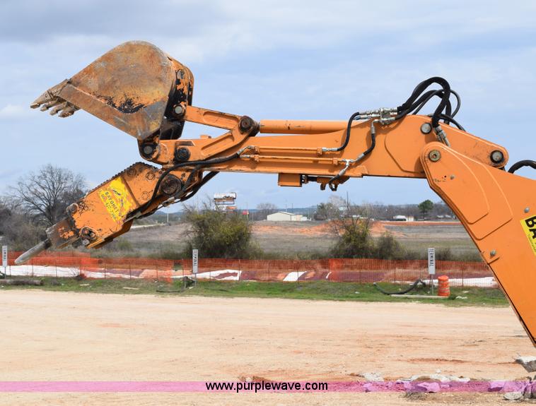 image for item E6289 2011 Case 580N backhoe with Bayonet Breaker