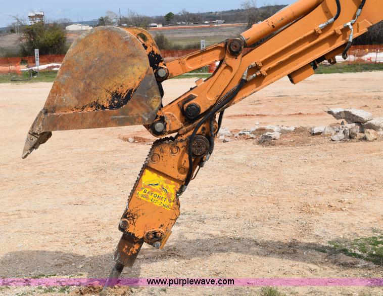 image for item E6289 2011 Case 580N backhoe with Bayonet Breaker