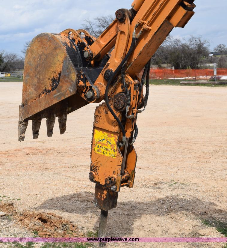 image for item E6289 2011 Case 580N backhoe with Bayonet Breaker