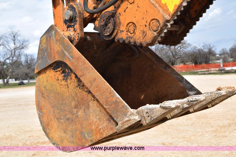 image for item E6289 2011 Case 580N backhoe with Bayonet Breaker