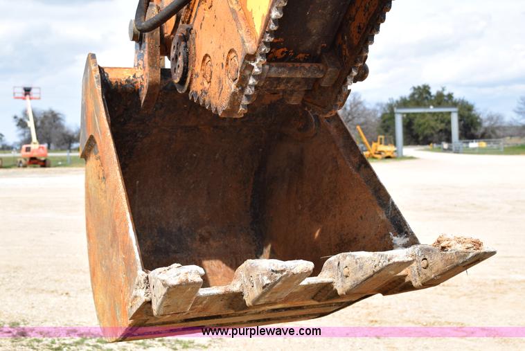 image for item E6289 2011 Case 580N backhoe with Bayonet Breaker