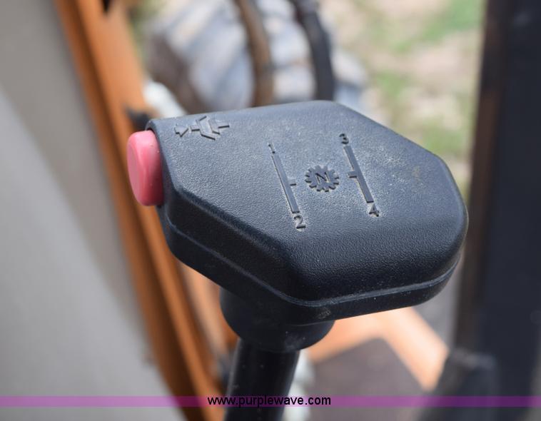 image for item E6289 2011 Case 580N backhoe with Bayonet Breaker