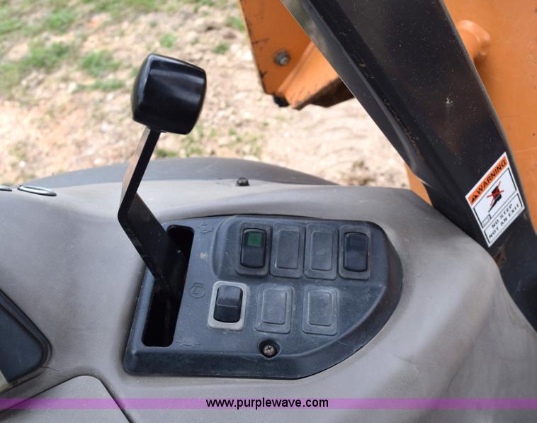 image for item E6289 2011 Case 580N backhoe with Bayonet Breaker