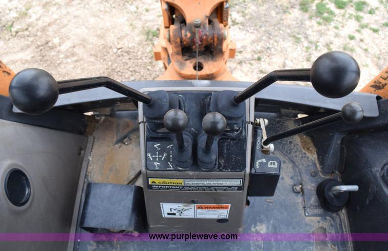 image for item E6289 2011 Case 580N backhoe with Bayonet Breaker