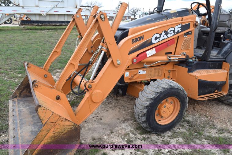 image for item E6289 2011 Case 580N backhoe with Bayonet Breaker