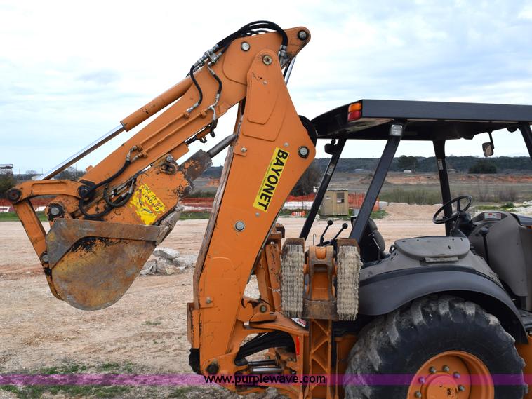 image for item E6289 2011 Case 580N backhoe with Bayonet Breaker