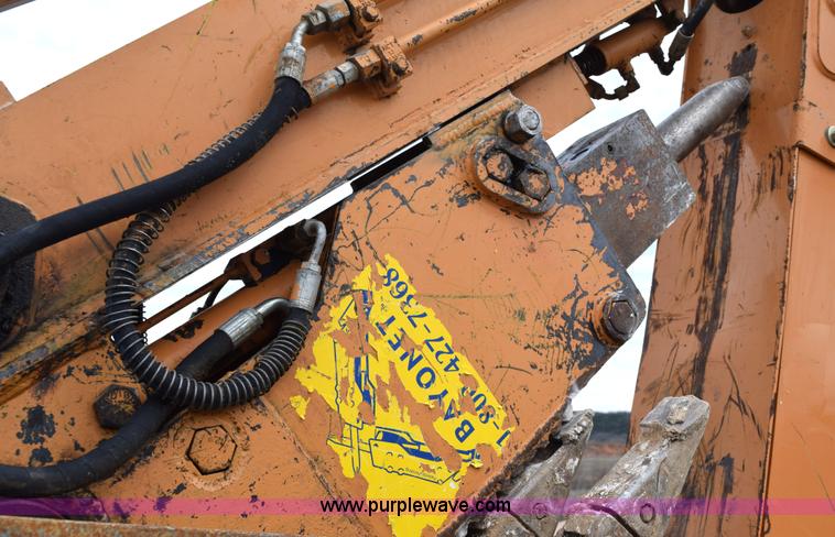 image for item E6289 2011 Case 580N backhoe with Bayonet Breaker