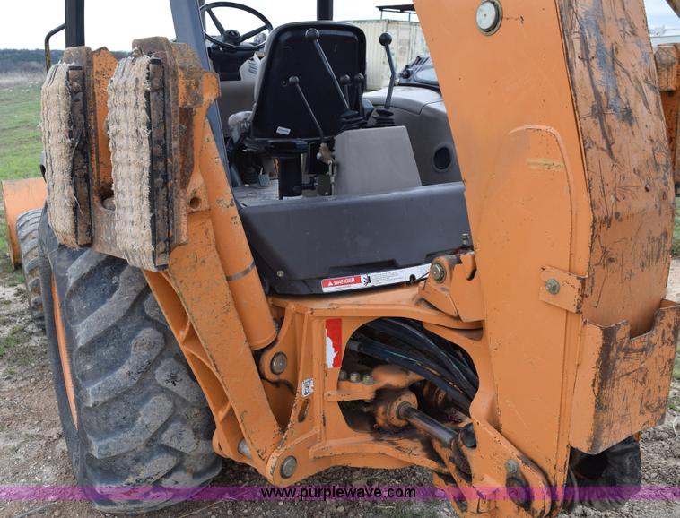 image for item E6289 2011 Case 580N backhoe with Bayonet Breaker