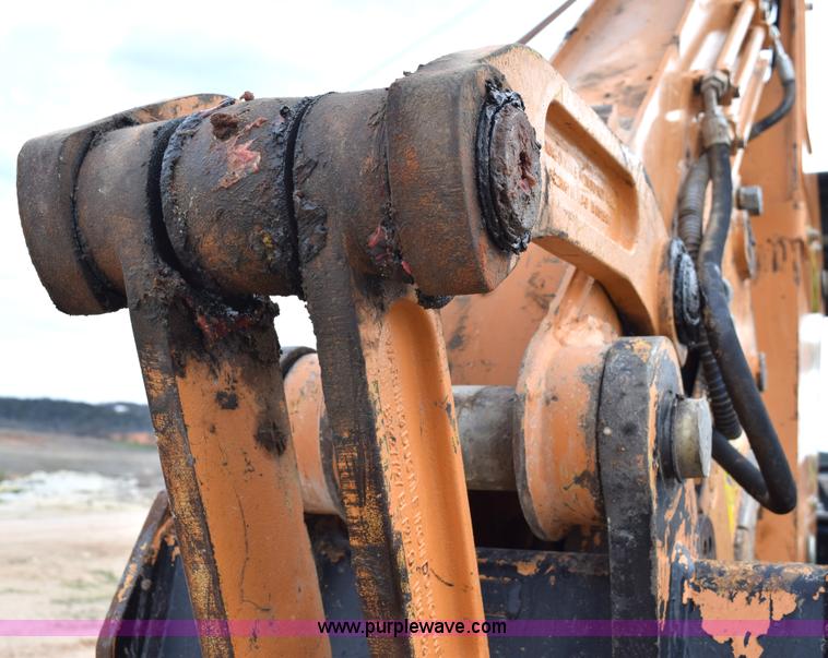 image for item E6289 2011 Case 580N backhoe with Bayonet Breaker