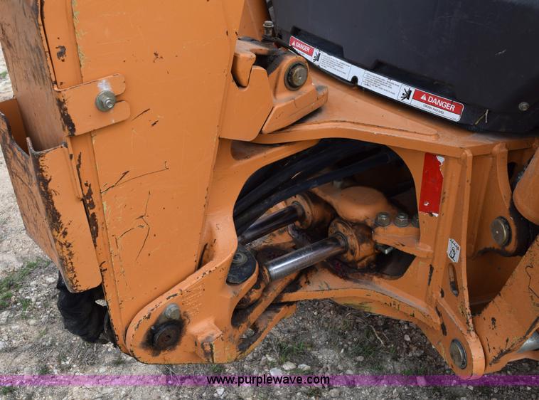 image for item E6289 2011 Case 580N backhoe with Bayonet Breaker
