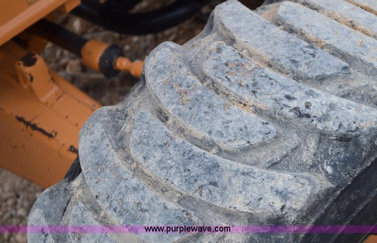 image for item E6289 2011 Case 580N backhoe with Bayonet Breaker