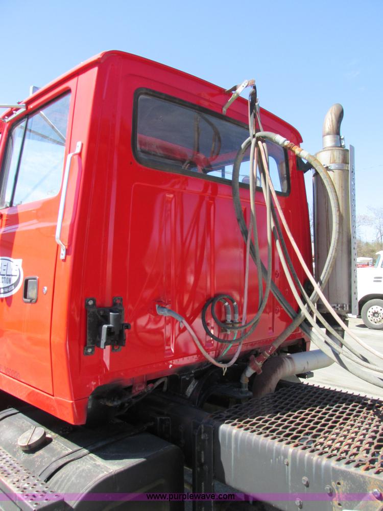 image for item E7451 1994 Ford LTL9000 semi truck