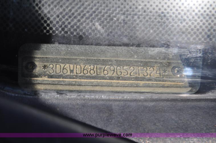 image for item F2347 2009 Dodge Ram 4500HD SLT Quad Cab flatbed truck