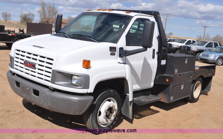 image for item F2349 2004 GMC C4500 flatbed truck