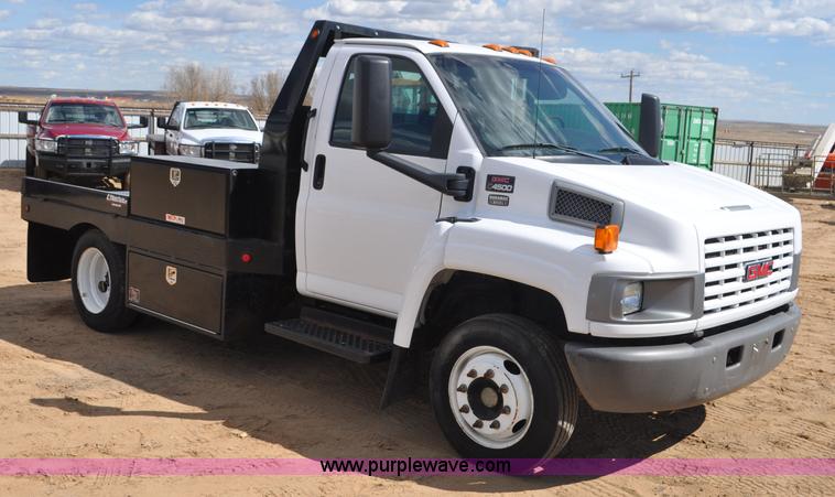 image for item F2349 2004 GMC C4500 flatbed truck