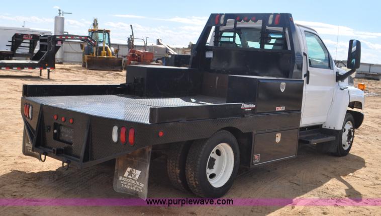 image for item F2349 2004 GMC C4500 flatbed truck