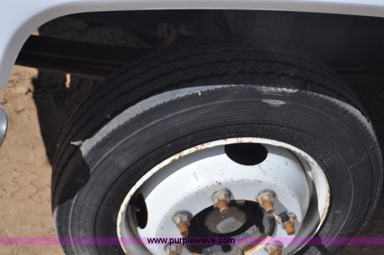 image for item F2349 2004 GMC C4500 flatbed truck