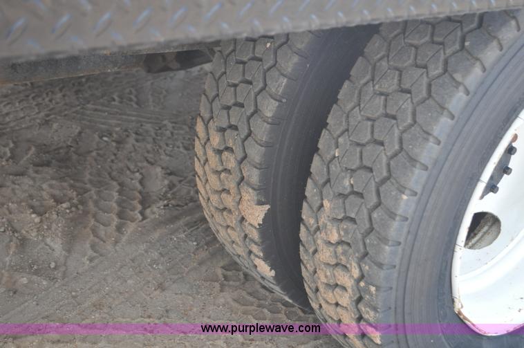 image for item F2349 2004 GMC C4500 flatbed truck