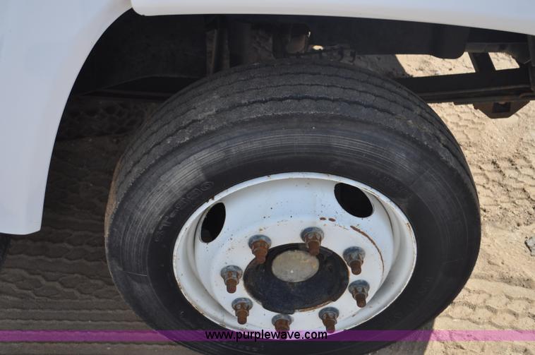 image for item F2349 2004 GMC C4500 flatbed truck