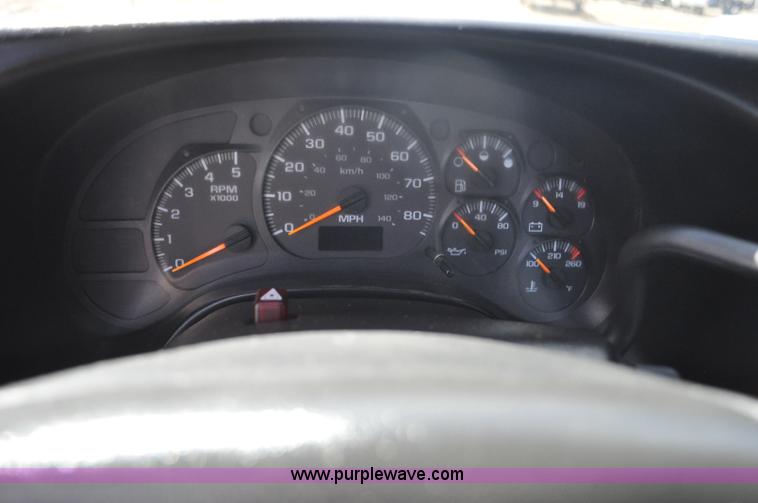 image for item F2349 2004 GMC C4500 flatbed truck