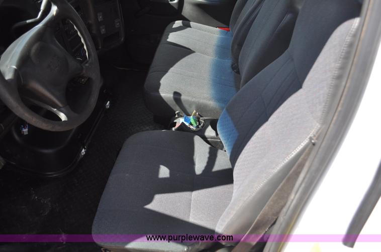 image for item F2349 2004 GMC C4500 flatbed truck