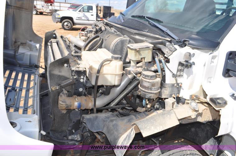 image for item F2349 2004 GMC C4500 flatbed truck