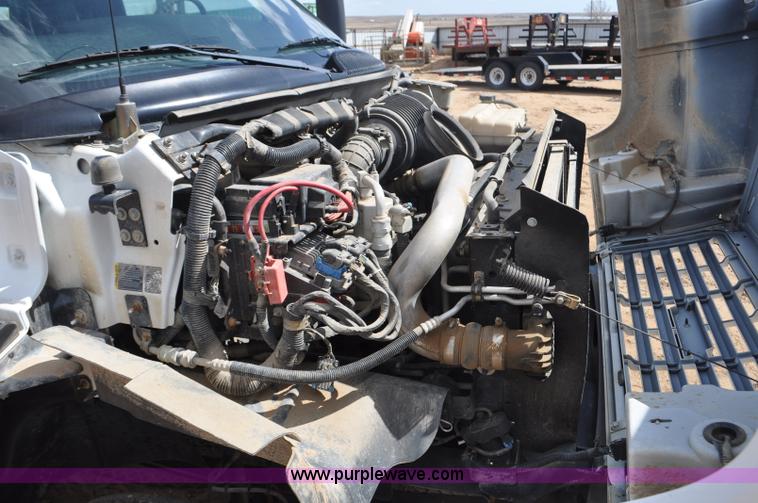 image for item F2349 2004 GMC C4500 flatbed truck