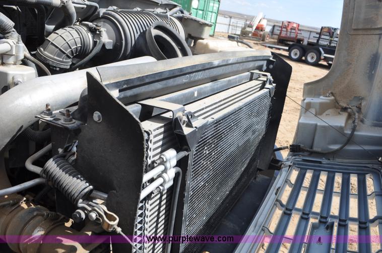 image for item F2349 2004 GMC C4500 flatbed truck