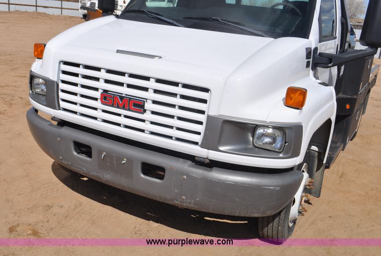 image for item F2349 2004 GMC C4500 flatbed truck