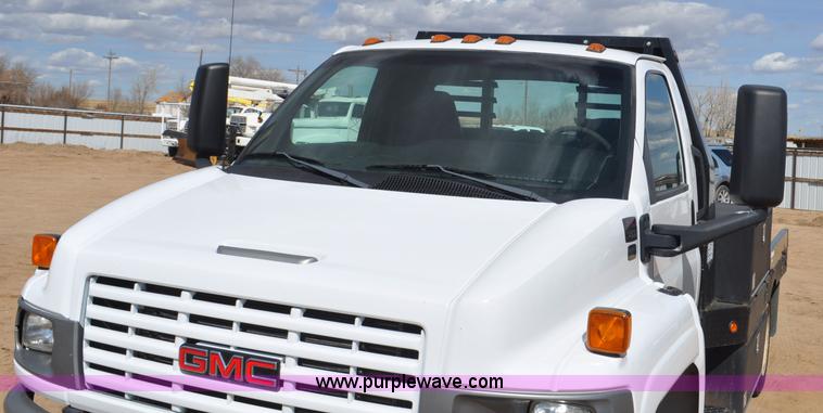 image for item F2349 2004 GMC C4500 flatbed truck