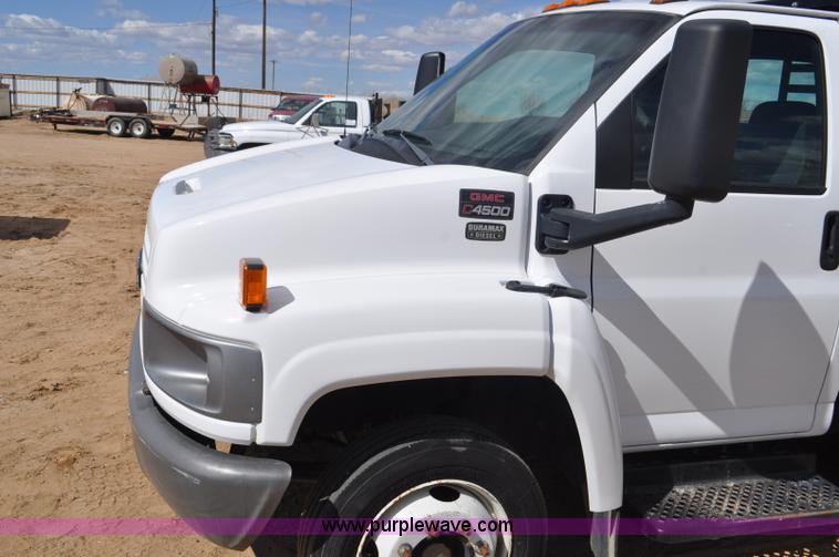 image for item F2349 2004 GMC C4500 flatbed truck
