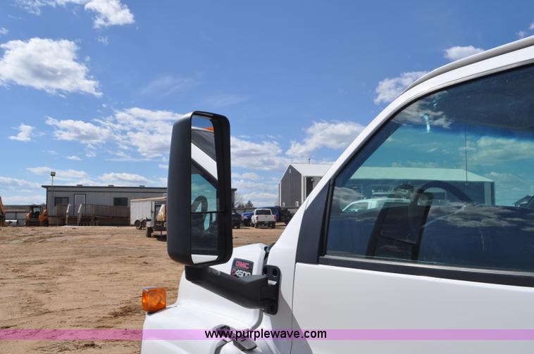 image for item F2349 2004 GMC C4500 flatbed truck