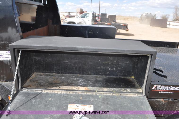 image for item F2349 2004 GMC C4500 flatbed truck