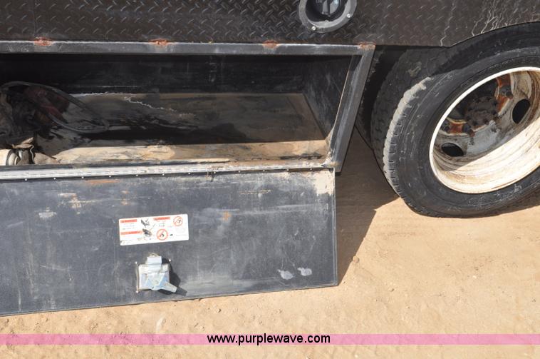 image for item F2349 2004 GMC C4500 flatbed truck