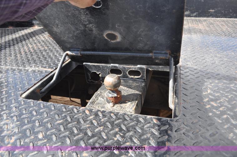 image for item F2349 2004 GMC C4500 flatbed truck