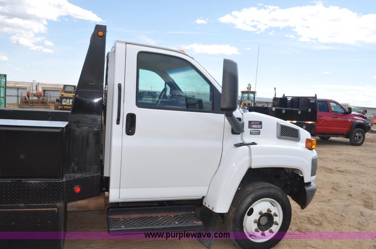 image for item F2349 2004 GMC C4500 flatbed truck