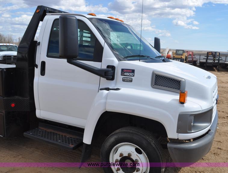 image for item F2349 2004 GMC C4500 flatbed truck