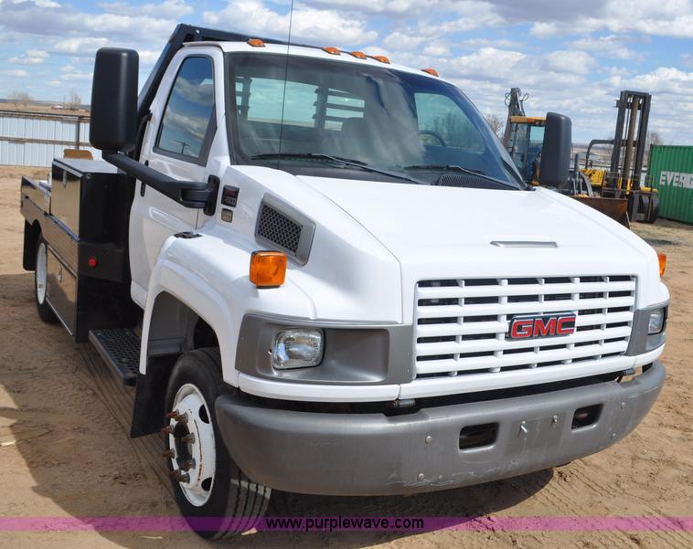 image for item F2349 2004 GMC C4500 flatbed truck
