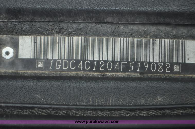 image for item F2349 2004 GMC C4500 flatbed truck