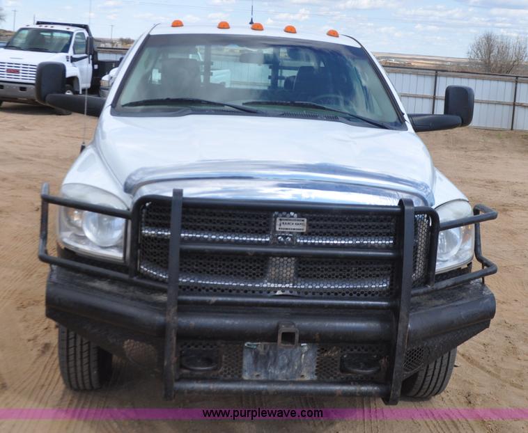 image for item F2352 2007 Dodge Ram 3500 Quad Cab flatbed truck
