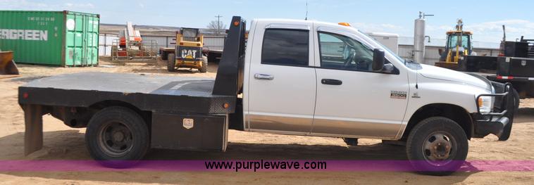image for item F2352 2007 Dodge Ram 3500 Quad Cab flatbed truck