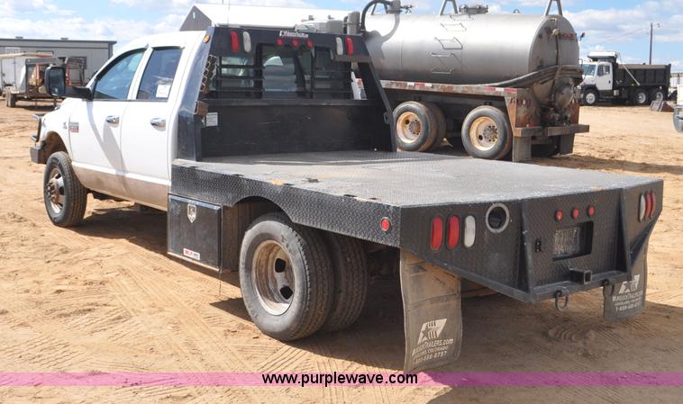 image for item F2352 2007 Dodge Ram 3500 Quad Cab flatbed truck